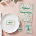 Printed wedding welcome sign, place card on a plate, table number and round topper