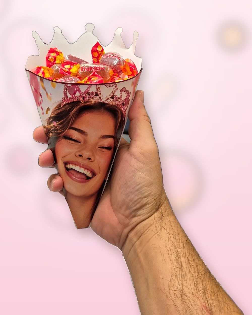 Printed party cone with a photo and a crown, filled with candy